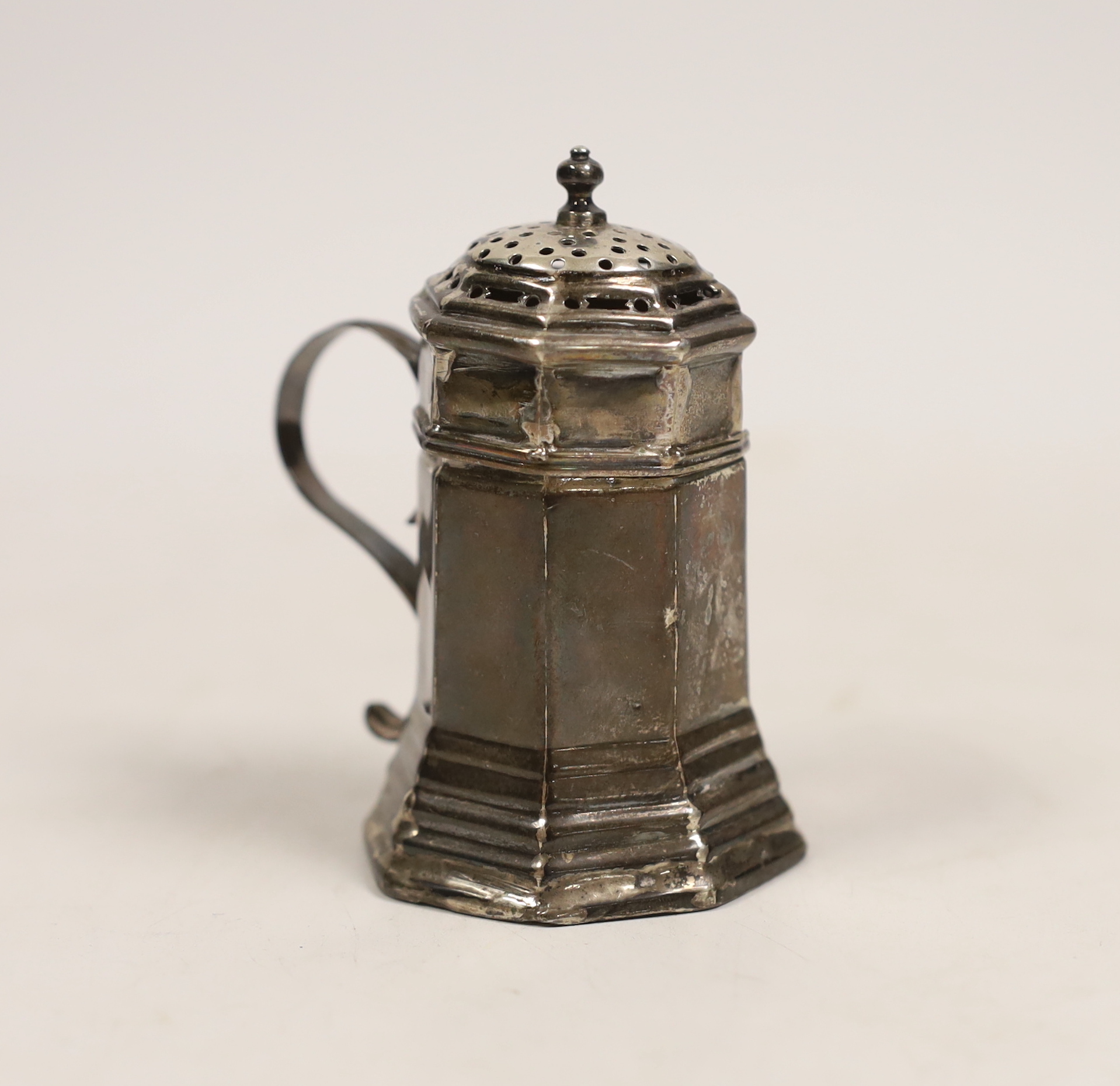 A Queen Anne silver octagonal kitchen dredger, Glover Johnson, London, 1713, 83mm(a.f.)